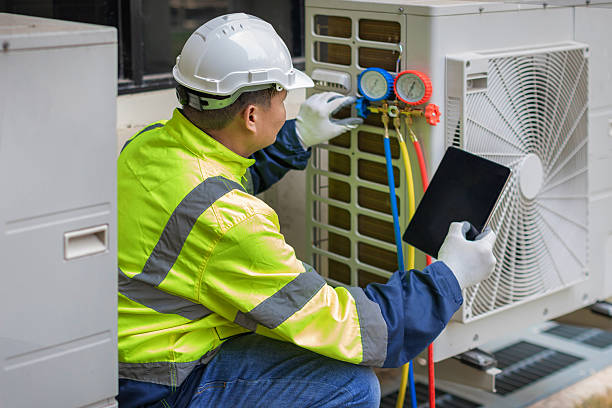 Professional Air Conditioning Repair technician working in Milan, IN